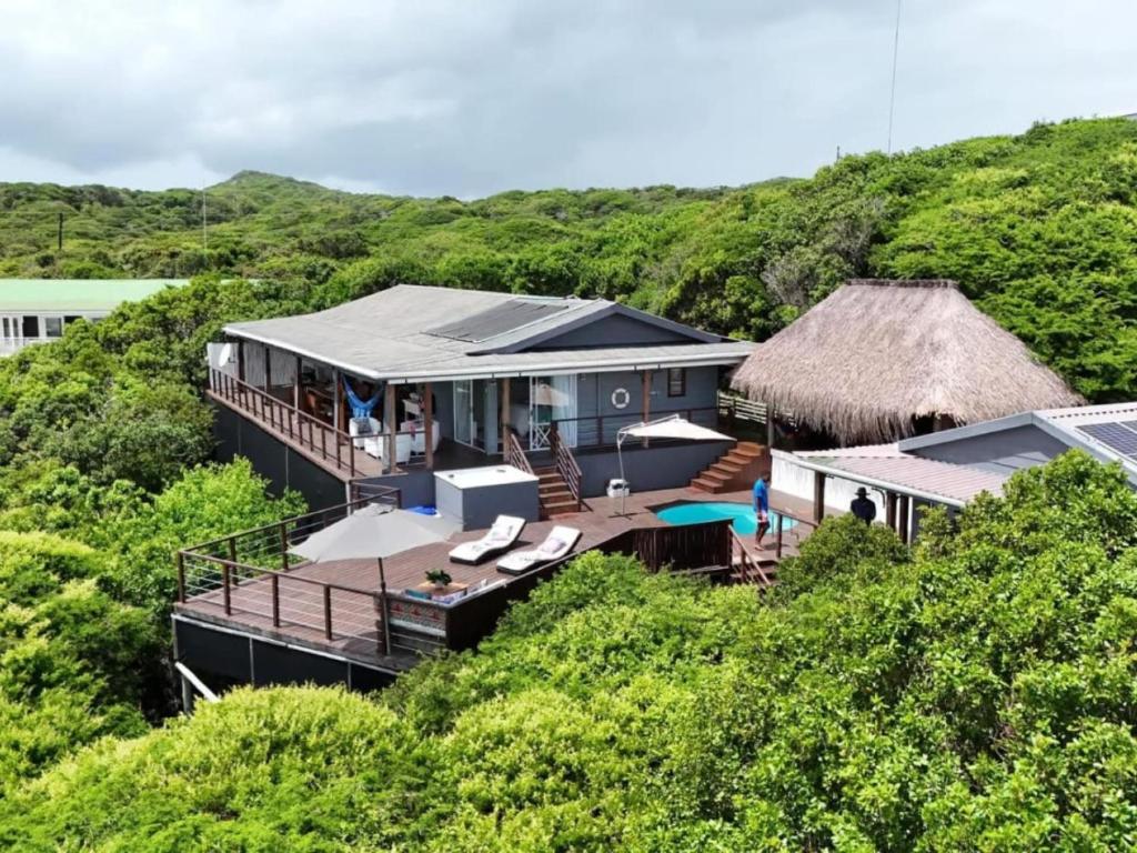 an aerial view of a house in the trees at Santa Vista 1 in Santa Maria