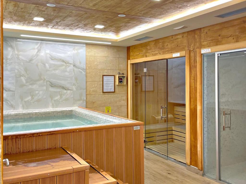 Ένα μπάνιο στο Apartman Tatarevic & Spa