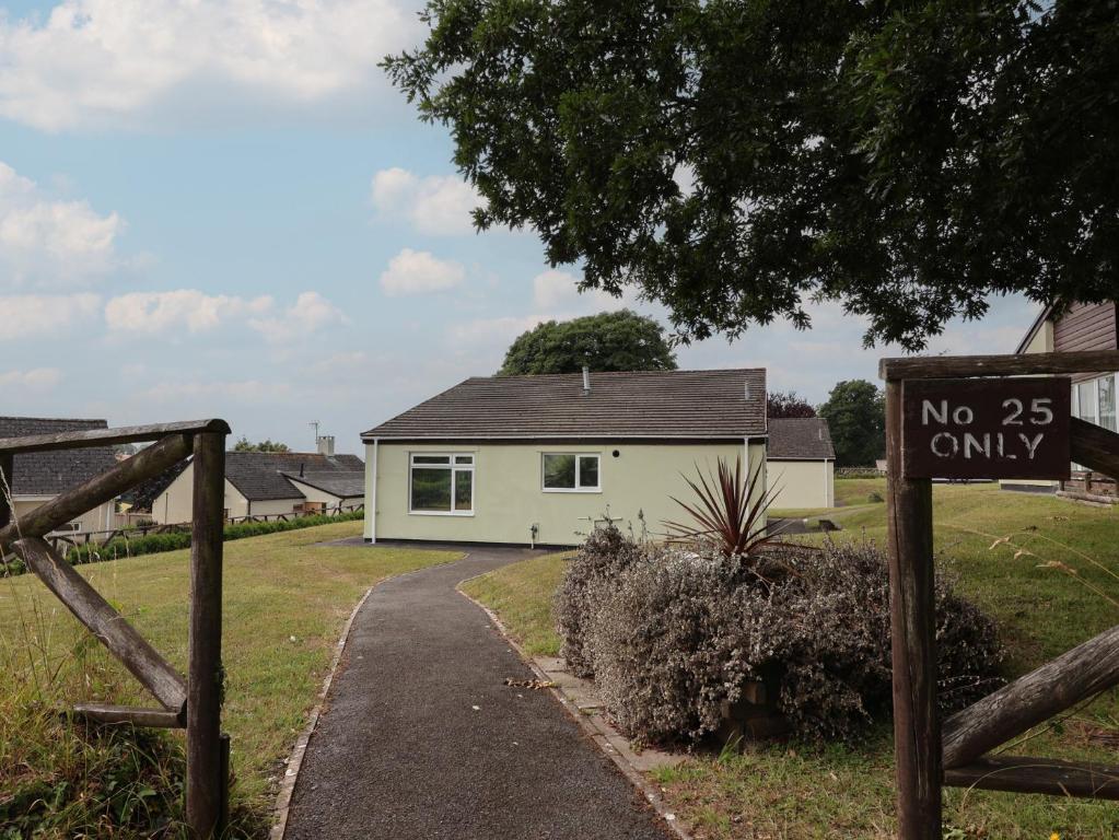 a no only sign in front of a house at A Devon Den at Harcombe House in Newton Abbot