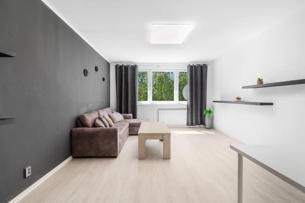 Posezení v ubytování Spacious 3-Bedroom Apartment with Park View in Petržalka