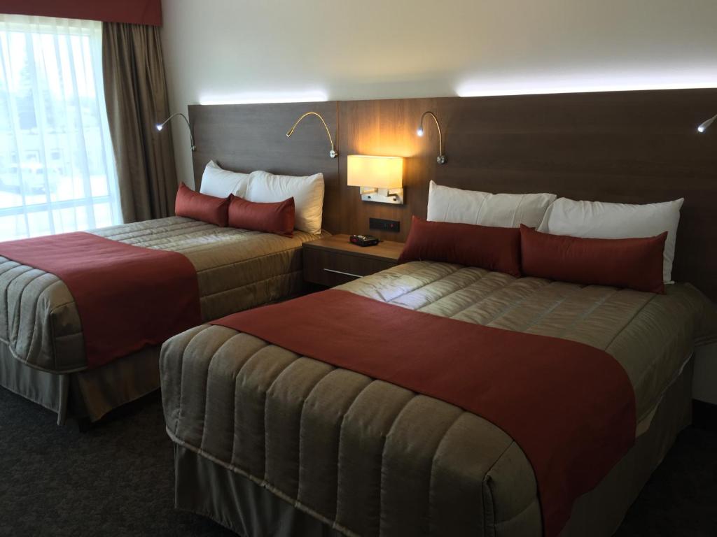 Postel nebo postele na pokoji v ubytování Motel Adam