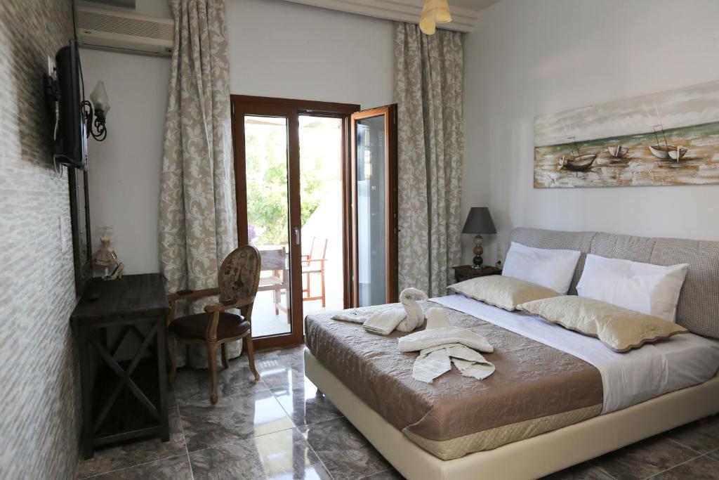 Postel nebo postele na pokoji v ubytování Skiathos Argento