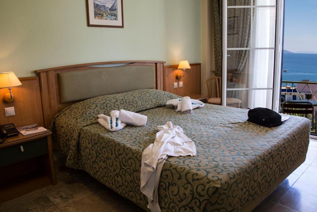 Postel nebo postele na pokoji v ubytování Tolon Holidays Hotel