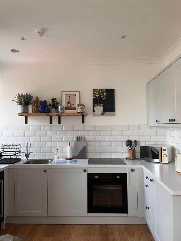 Køkken eller tekøkken på The Wee Harbour Home