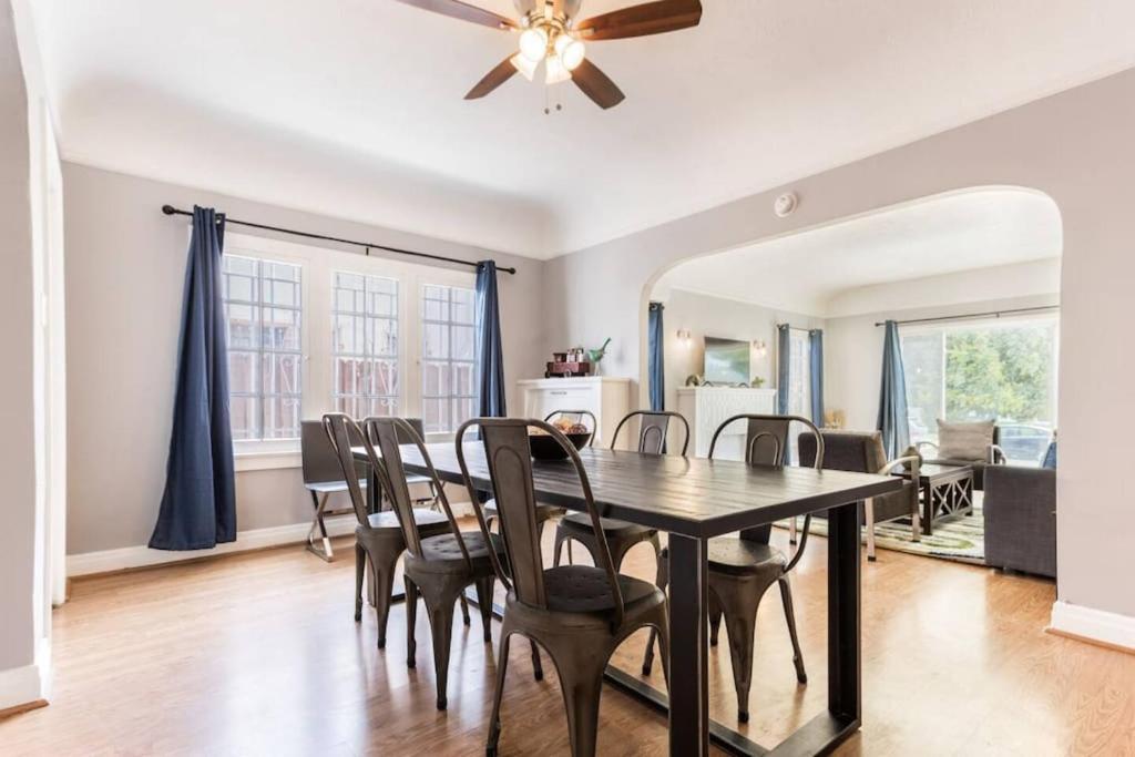 a dining room with a table and chairs at Magnificent House Minutes From Hollywood in Los Angeles