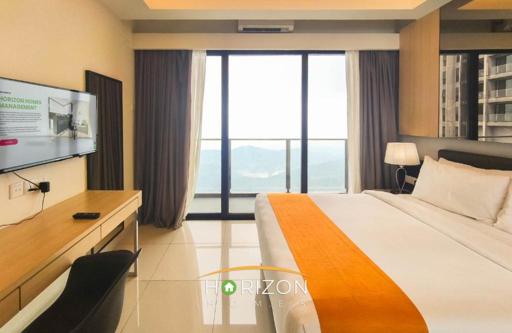 Ένα ή περισσότερα κρεβάτια σε δωμάτιο στο Horizon Plus at Genting Highlands