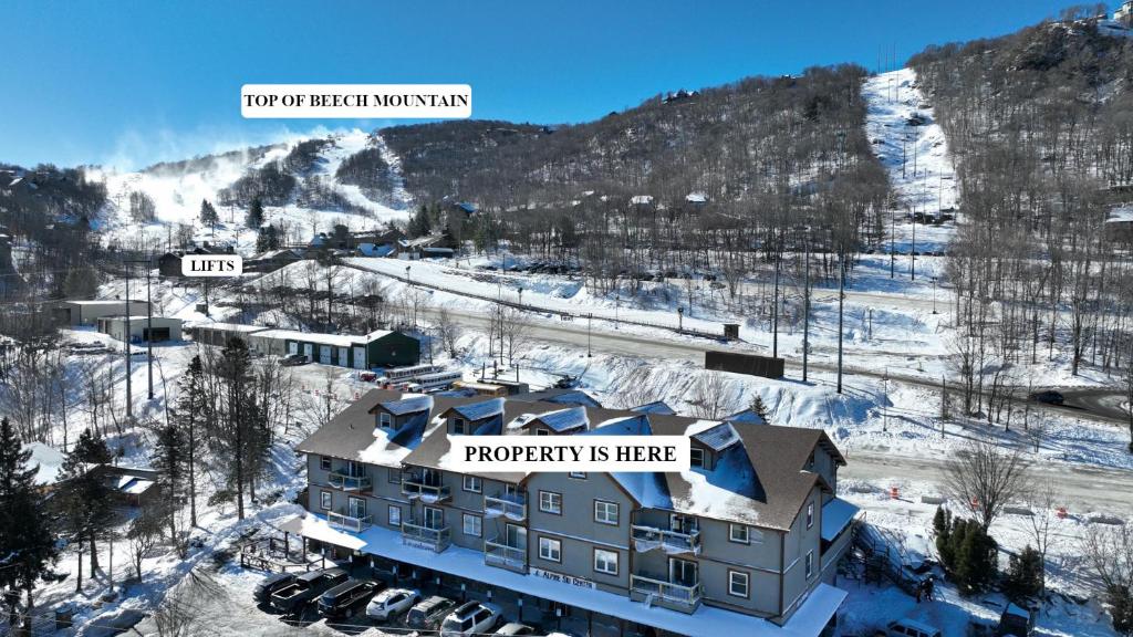 an aerial view of a hotel in the snow at Ski Resort Backyard Walk to Lifts Brewery Coffee in Beech Mountain
