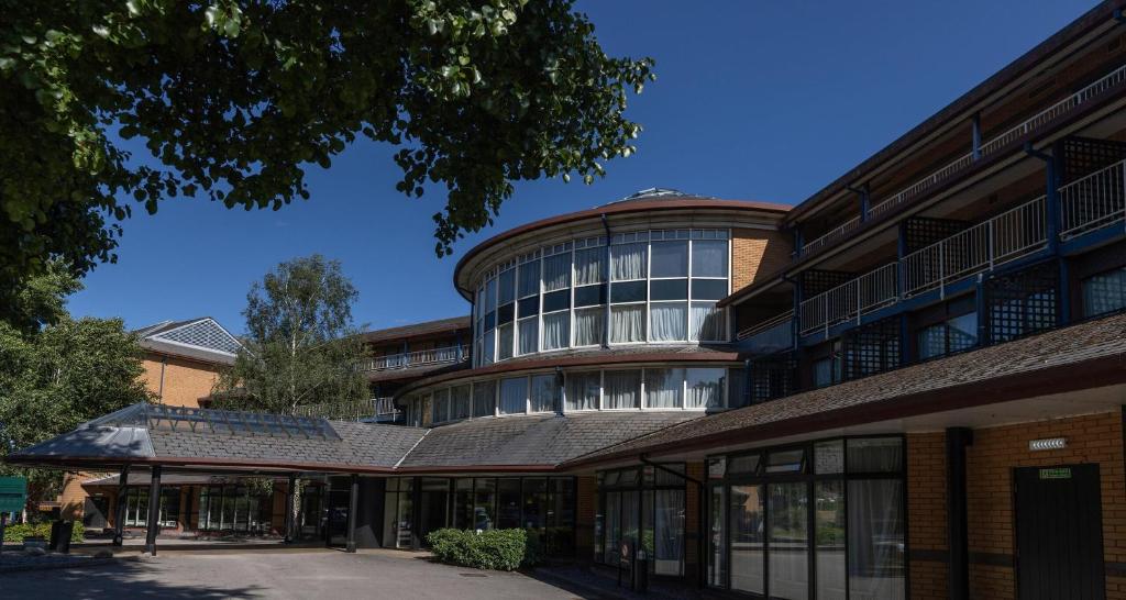 an university building with a large glass building at Derby Mickleover Hotel, BW Signature Collection in Derby