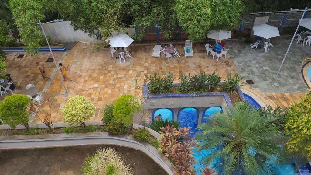 an aerial view of a patio with a swimming pool at Apartamento Caldas Novas in Caldas Novas