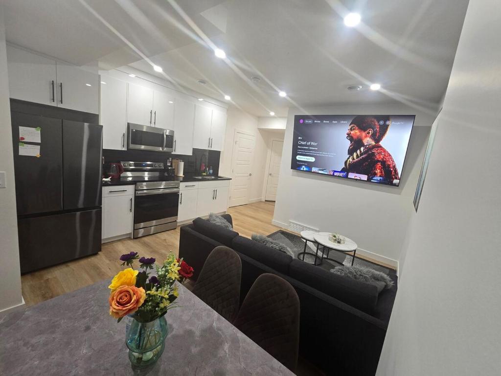Cozy 2-Bedroom Basement Suite Just Minutes from the Airport photo