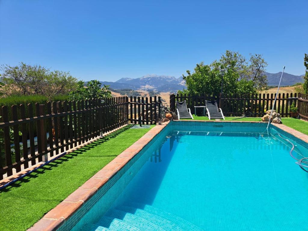 Bazén v ubytování La casita encantada nebo v jeho okolí