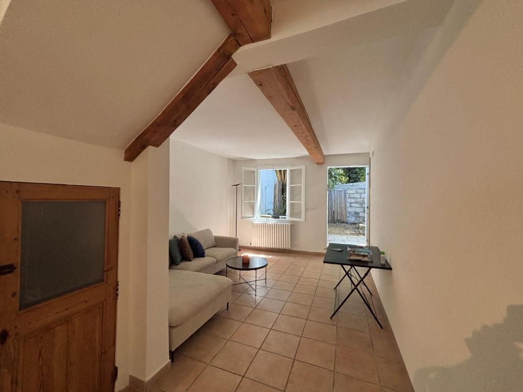 Χώρος καθιστικού στο Charmante maison de ville avec cour intérieur