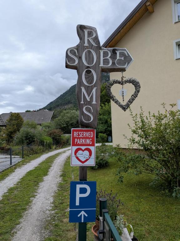 a sign that says stopnm next to a road at Gorski biser in Mojstrana