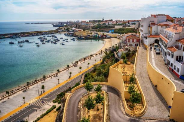 an aerial view of a beach with boats in the water at Casa Ponte do Mar in Sines