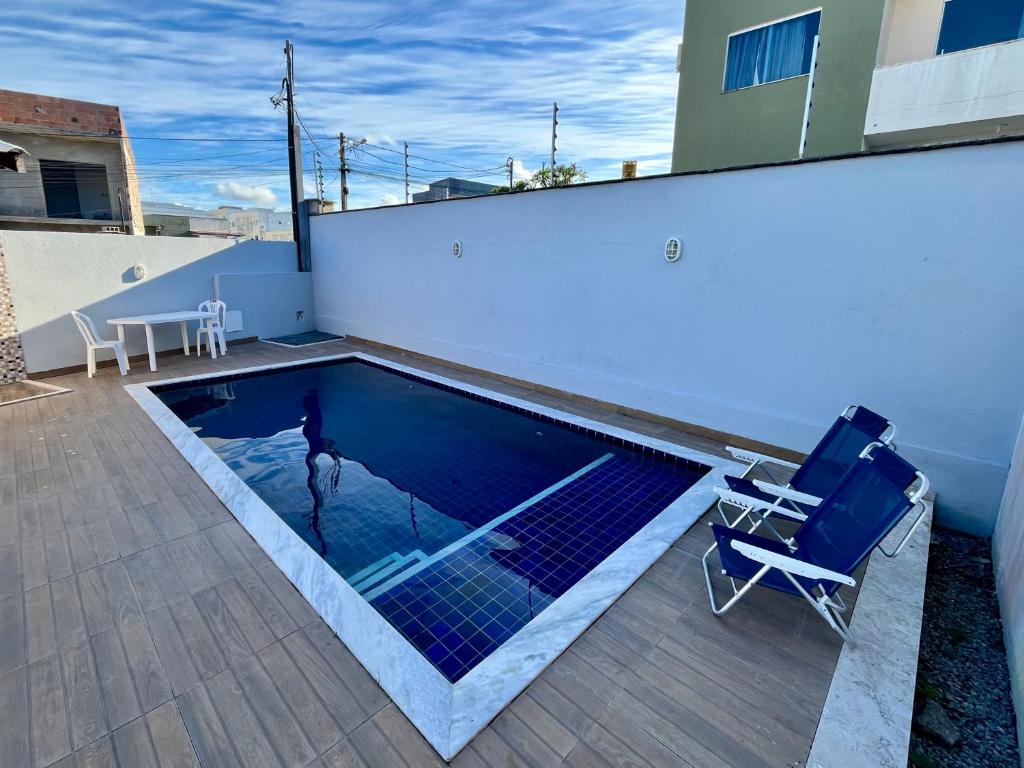 Swimmingpoolen hos eller tæt på Casa Oliveira - Residencial Caminho da Praia