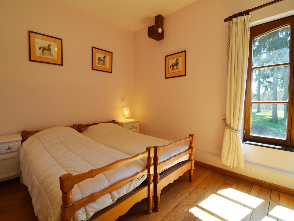 Postel nebo postele na pokoji v ubytování Cottage with Tennis Court