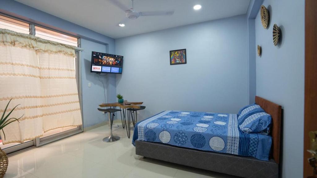 Katil atau katil-katil dalam bilik di Habitación cómoda y bien ubicada