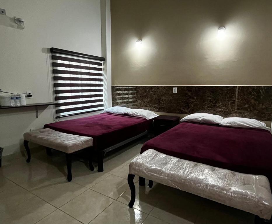 Hotel Villas Inn - Vierbettzimmer