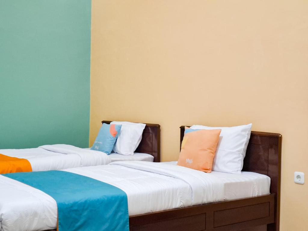 Sans Hotel Syariah Purnama Nganjuk - Quarto Twin Deluxe