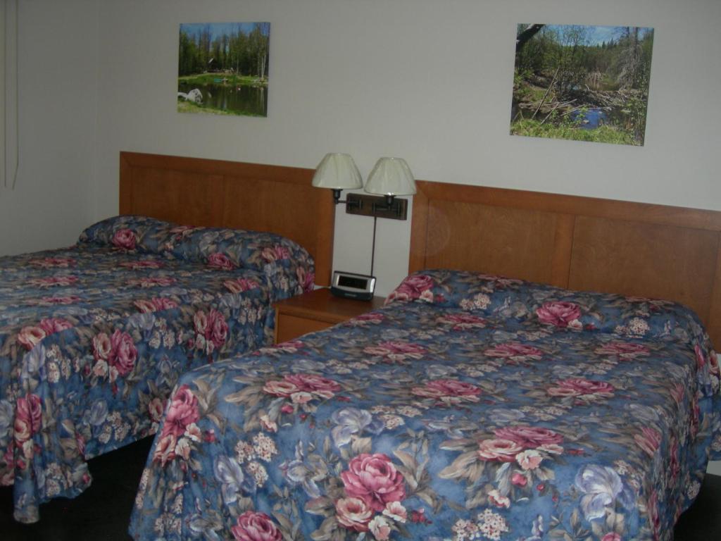 Postel nebo postele na pokoji v ubytování Hotel Motel Arnold