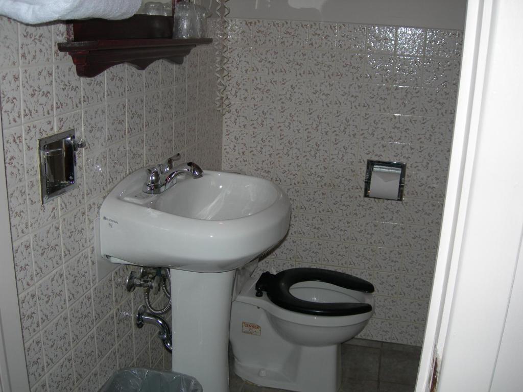 Koupelna v ubytování Hotel Motel Arnold
