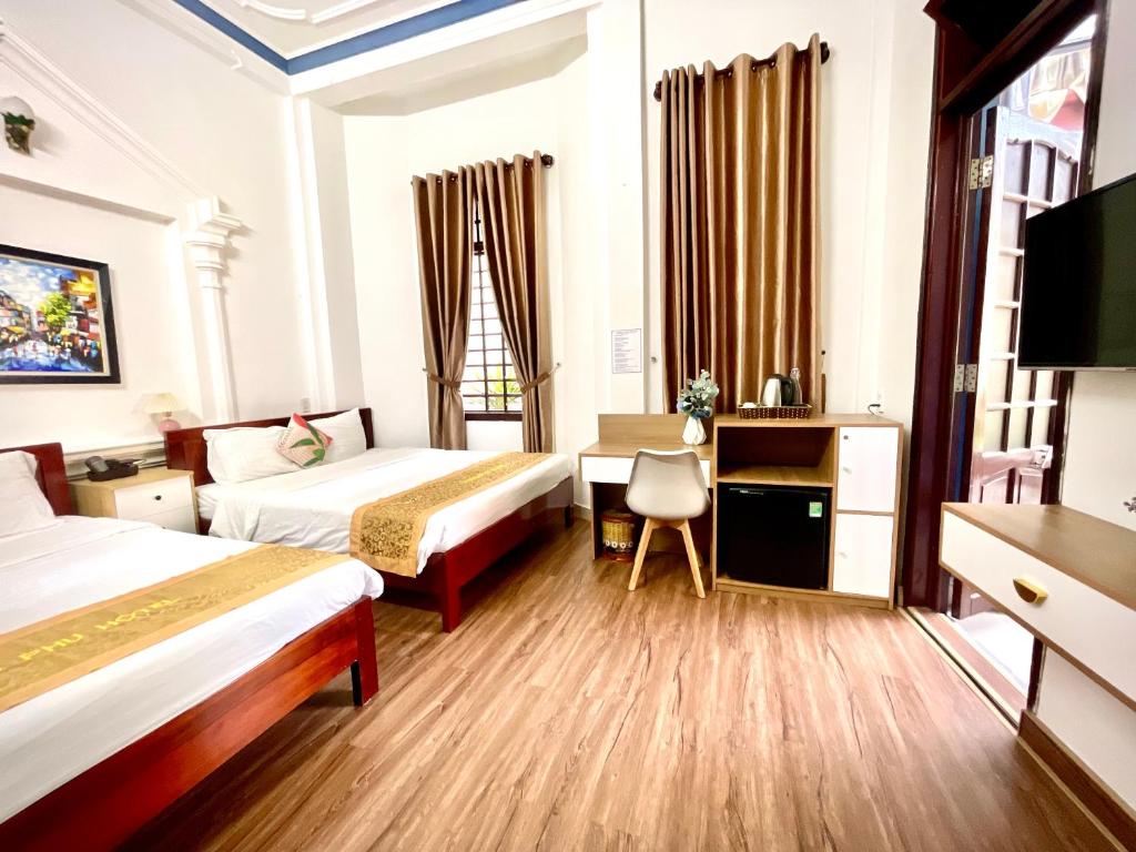 Giường trong phòng chung tại Eva Homestay