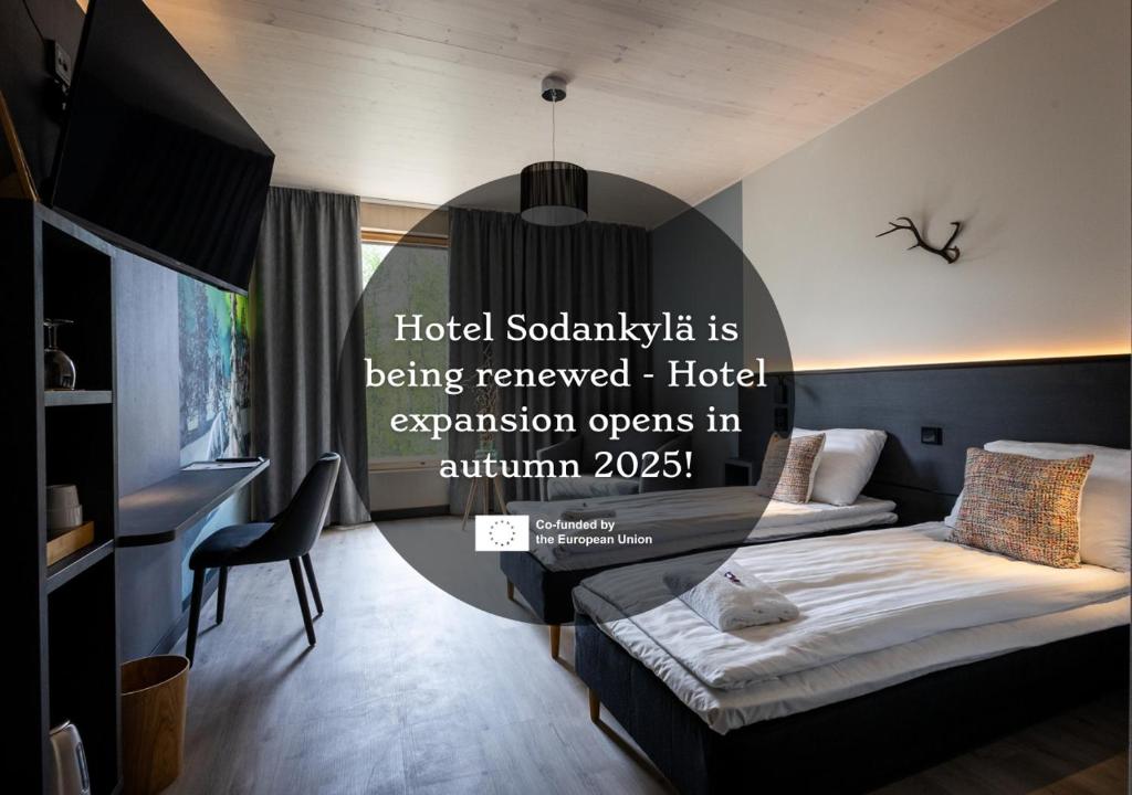 Ένα ή περισσότερα κρεβάτια σε δωμάτιο στο Hotelli Sodankylä