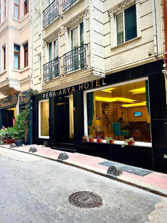 a store front of a hotel on a city street at Pera Arya Hotel in Istanbul