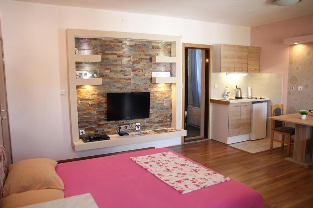 Kuchyň nebo kuchyňský kout v ubytování Lilian Apartments