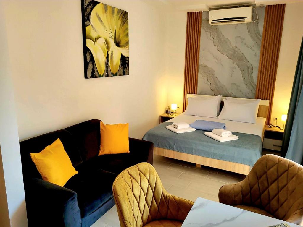 En eller flere senge i et værelse på Aquamarine Jaz Montenegro