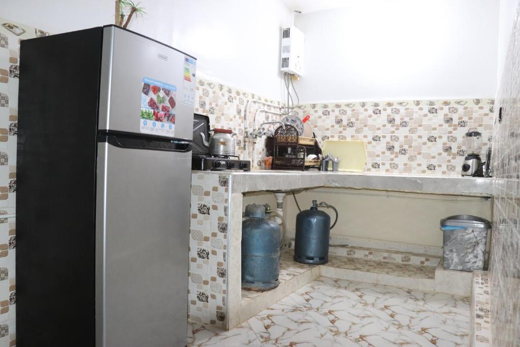 Køkken eller tekøkken på Résidence SEHRAWILOCATION