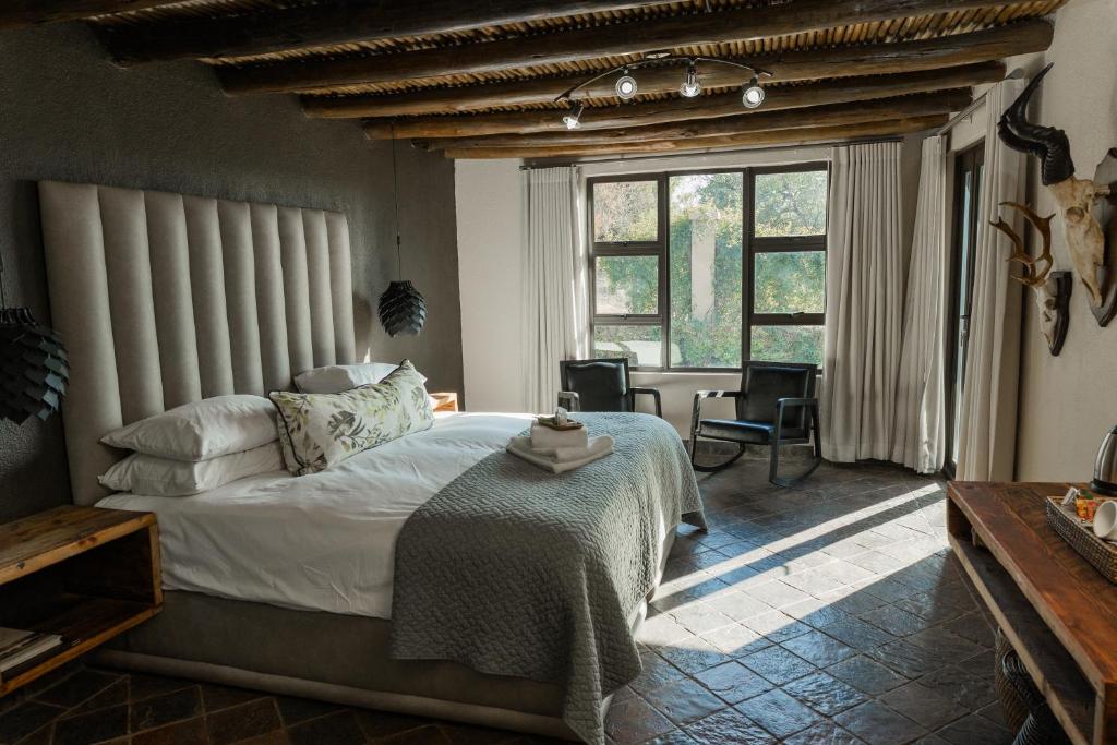 Katil atau katil-katil dalam bilik di Bona Bona Game Lodge