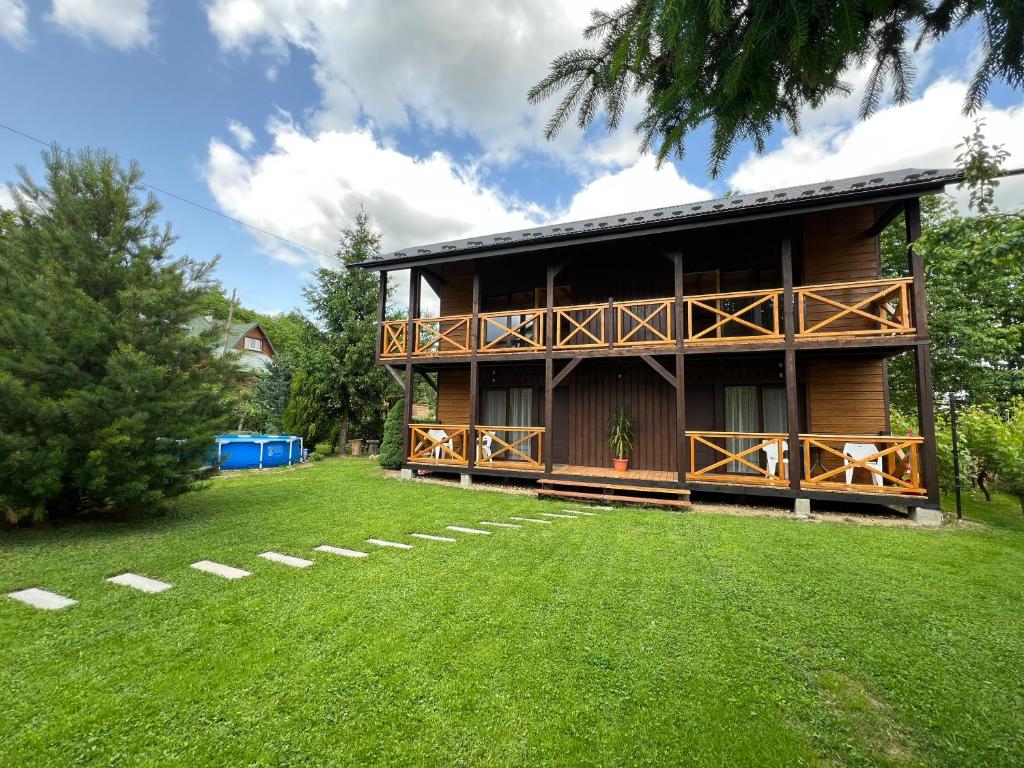 Κήπος έξω από το Sita Apartments