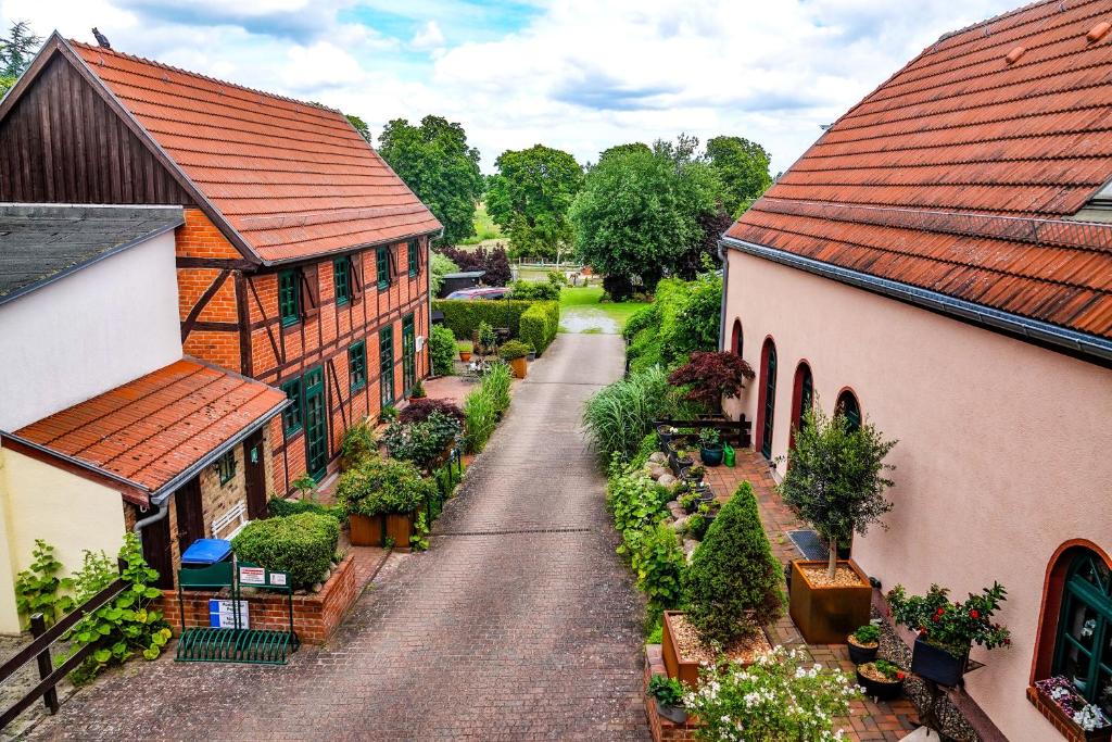an aerial view of a street between two buildings at Richtenberger Ente Apartments Ferienwohnungen in Richtenberg