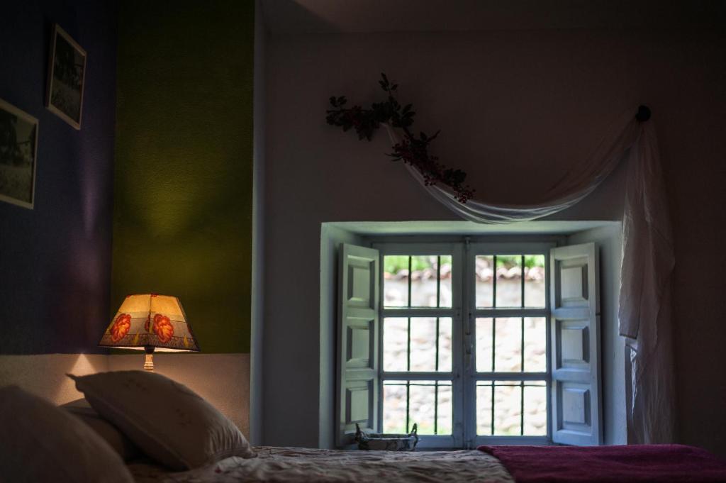 Postel nebo postele na pokoji v ubytování vaquero casa rural alquiler completo