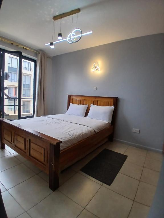 Postel nebo postele na pokoji v ubytování Residence next door 2br Coral