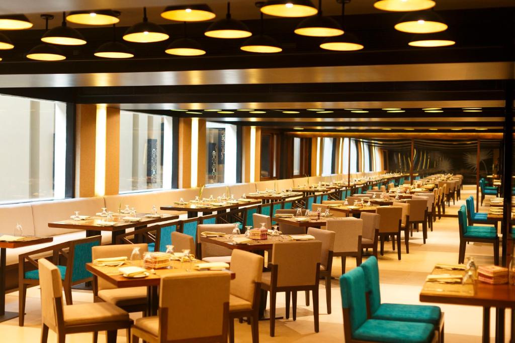 Restaurace v ubytování Renuka City Hotel