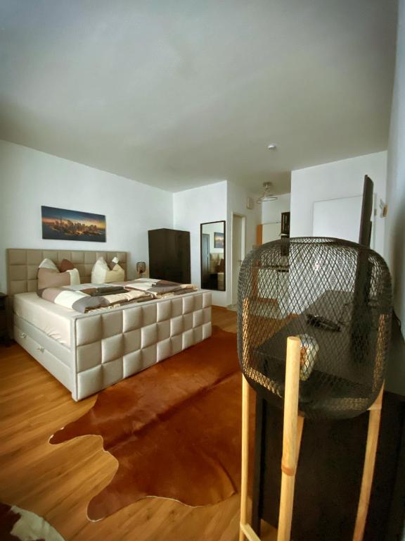 a living room with a bed and a couch at Talgarten Studio 8 in Erfurt