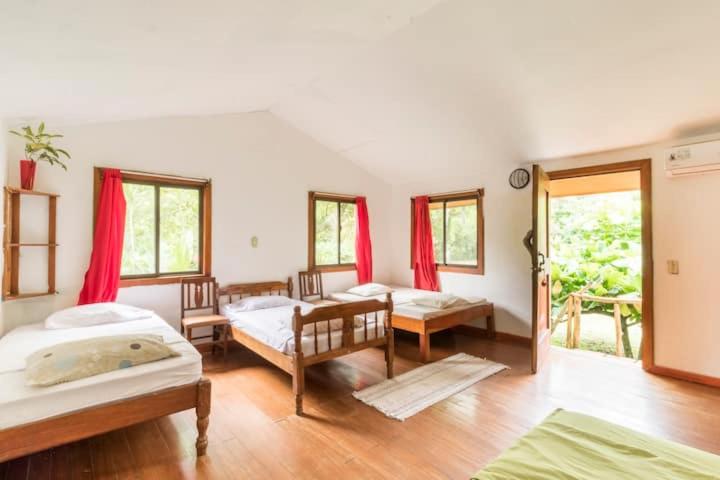 Ένα ή περισσότερα κρεβάτια σε δωμάτιο στο Casa De Campo LaPiña