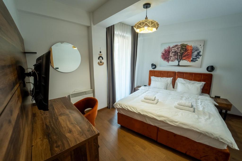 Ένα ή περισσότερα κρεβάτια σε δωμάτιο στο Pino Monte