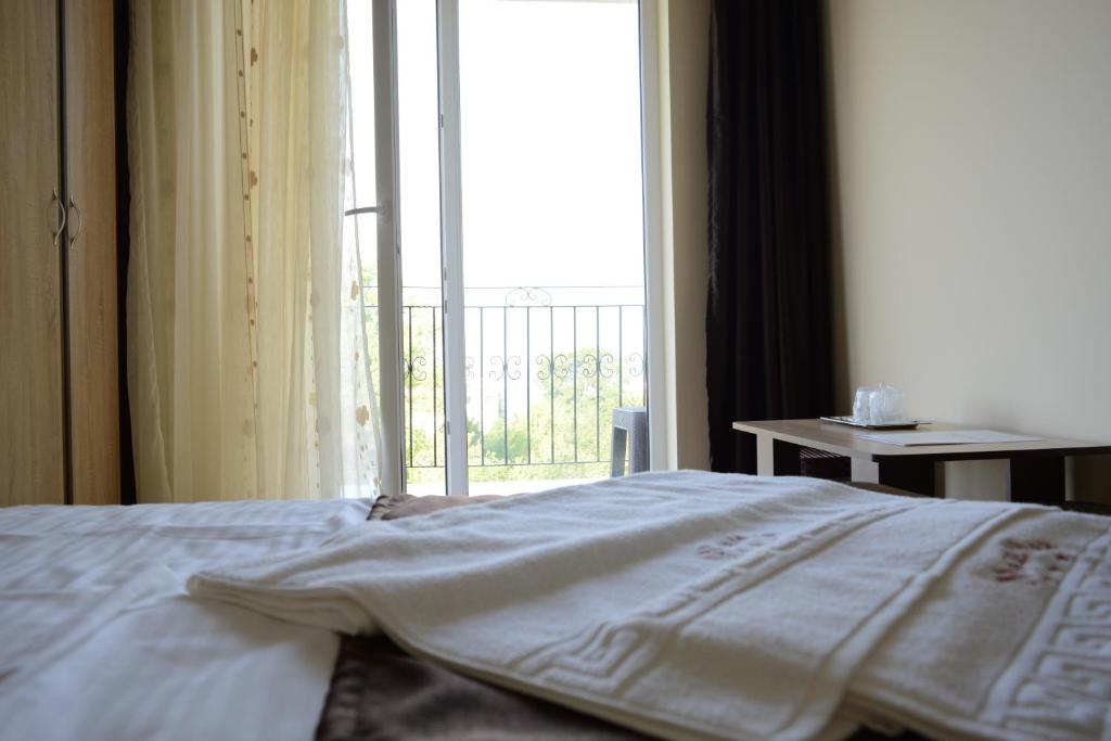 Postel nebo postele na pokoji v ubytování Hotel MareMar