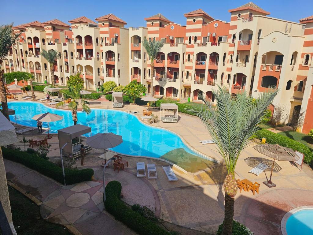 an aerial view of a resort with a swimming pool at Pool & Beach Apartment in Sharm El Sheikh