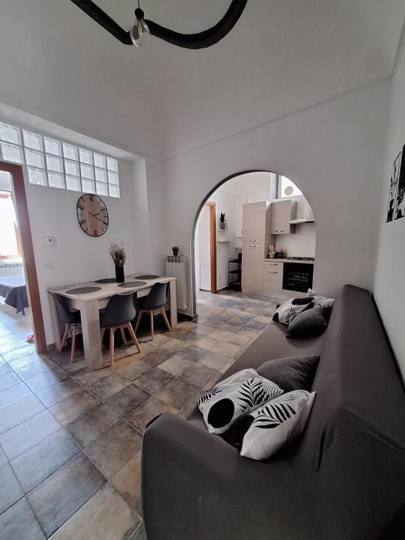 a living room with a couch and a table at Casa Conti Trivelli in Vasto