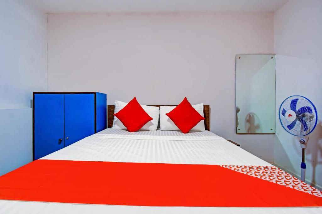 Katil atau katil-katil dalam bilik di Hotel O Relax Inn