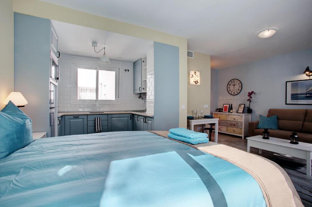 Posteľ alebo postele v izbe v ubytovaní Malaga Lodge Studio