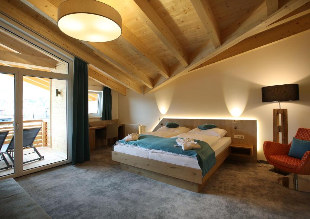 Postel nebo postele na pokoji v ubytování Aktiv- und Wellnesshotel Gutjahr