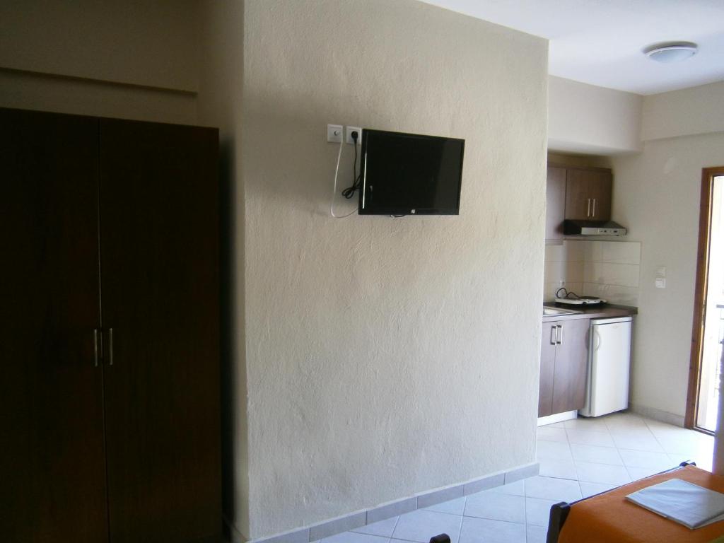 Kuchyň nebo kuchyňský kout v ubytování Kiparissis Apartments