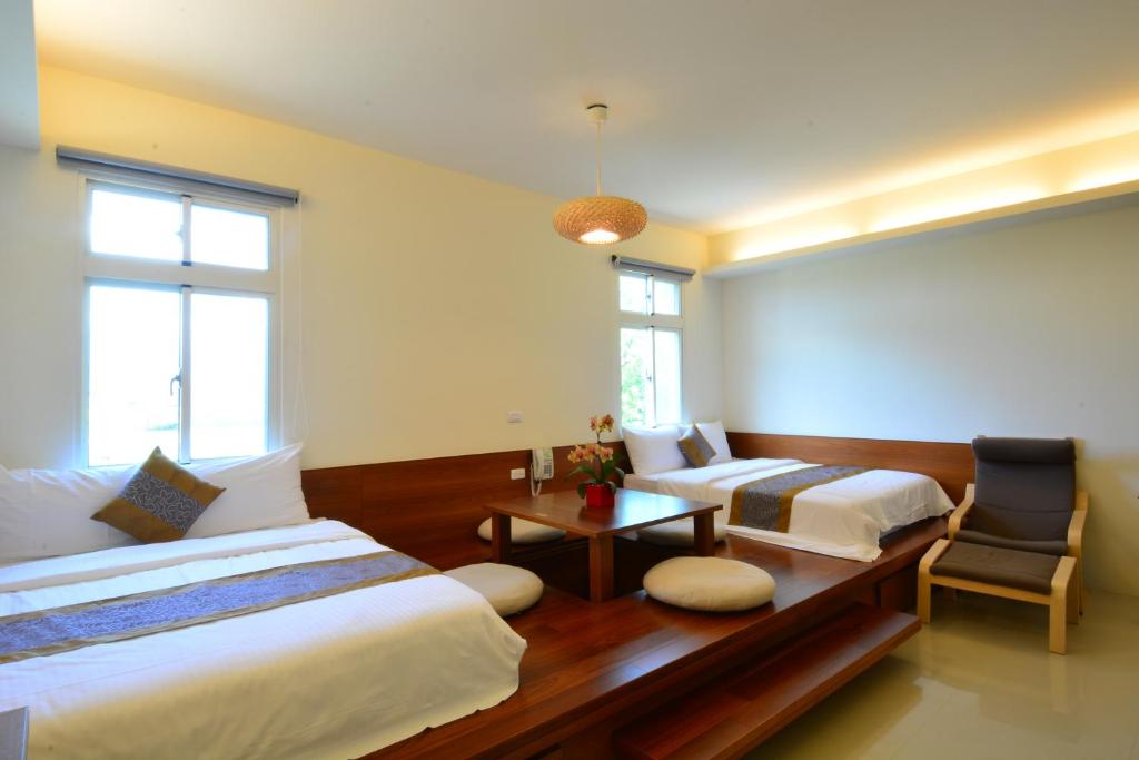 Postel nebo postele na pokoji v ubytování Simple Happiness B&B