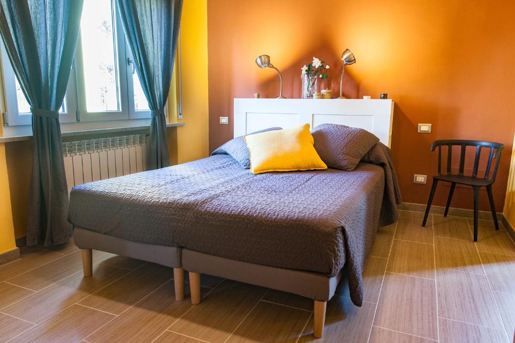 Postel nebo postele na pokoji v ubytování La Casermina