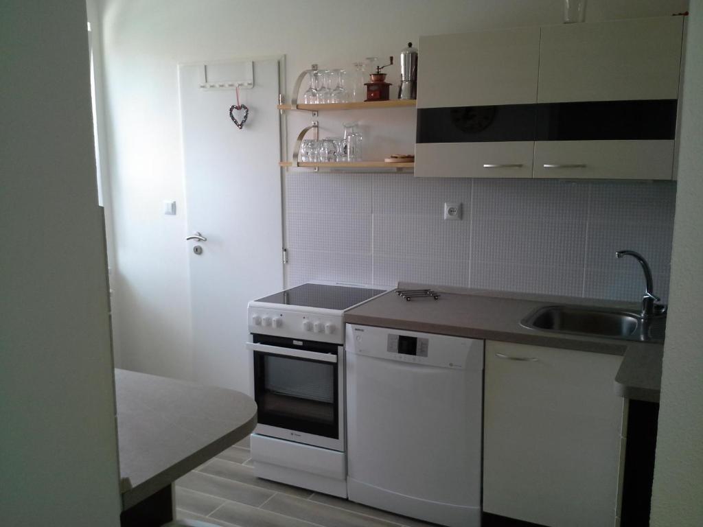 Kuchyň nebo kuchyňský kout v ubytování Apartmán Hastrmánek, Kvilda 3